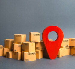 Lots,of,cardboard,boxes,and,a,red,position,pin.,locating